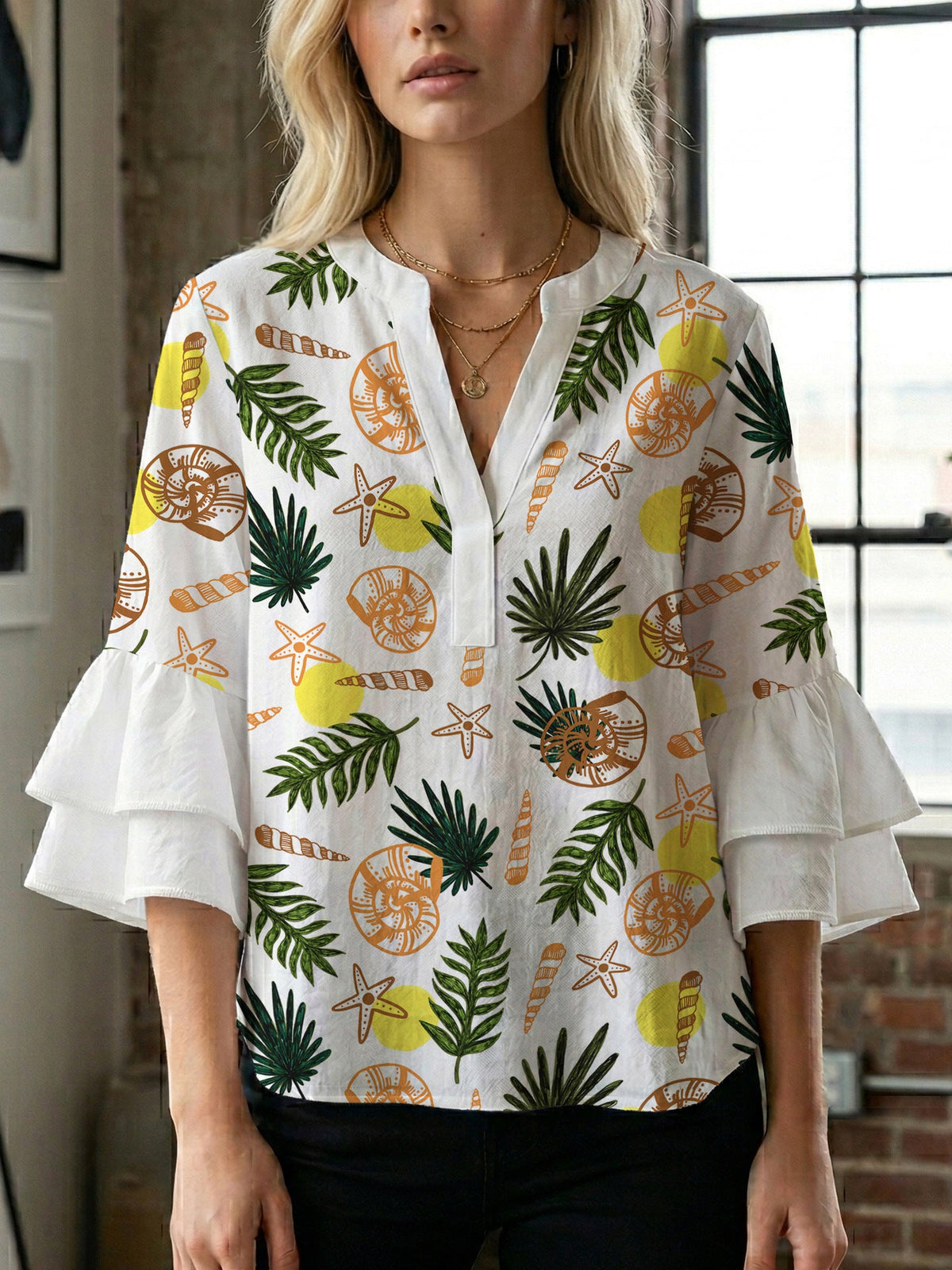 Women's Blouse with Voluminous Ruffle Sleeves and Modern Print