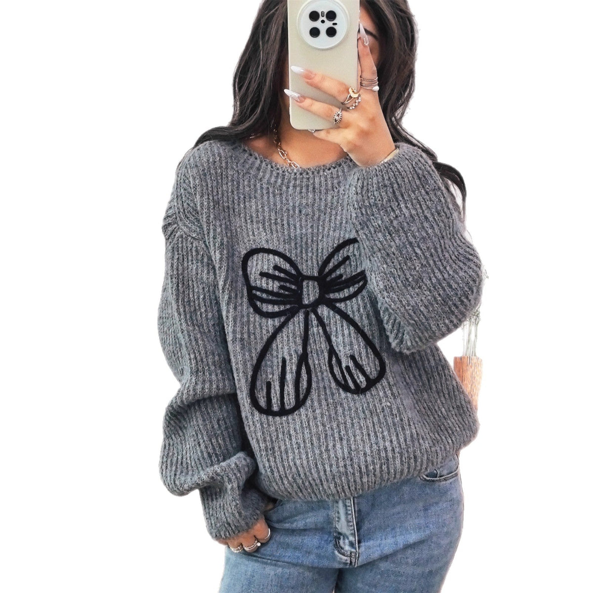 Women's Chunky Knit Sweater with Playful Bow Motif