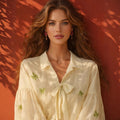 Women's Blouse with Ruffle Details and Floral Embroidery