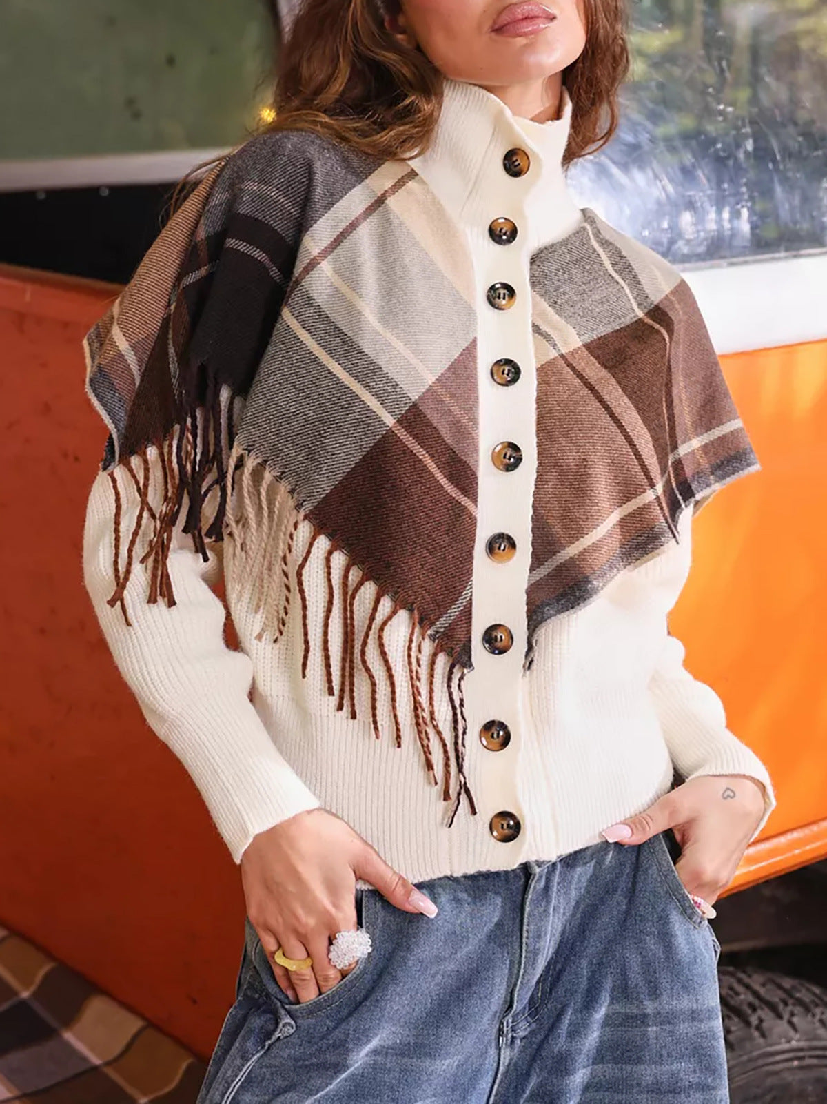 Elegant Cardigan with Fringe and Decorative Buttons