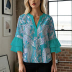 Women's Blouse with Voluminous Ruffle Sleeves and Floral Design