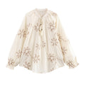 Women's Blouse with Floral Embroidery and Elegant Tassels