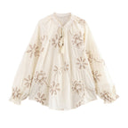 Women's Blouse with Floral Embroidery and Elegant Tassels