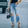 Women's High-Waisted Jeans with Frayed Details and Rips