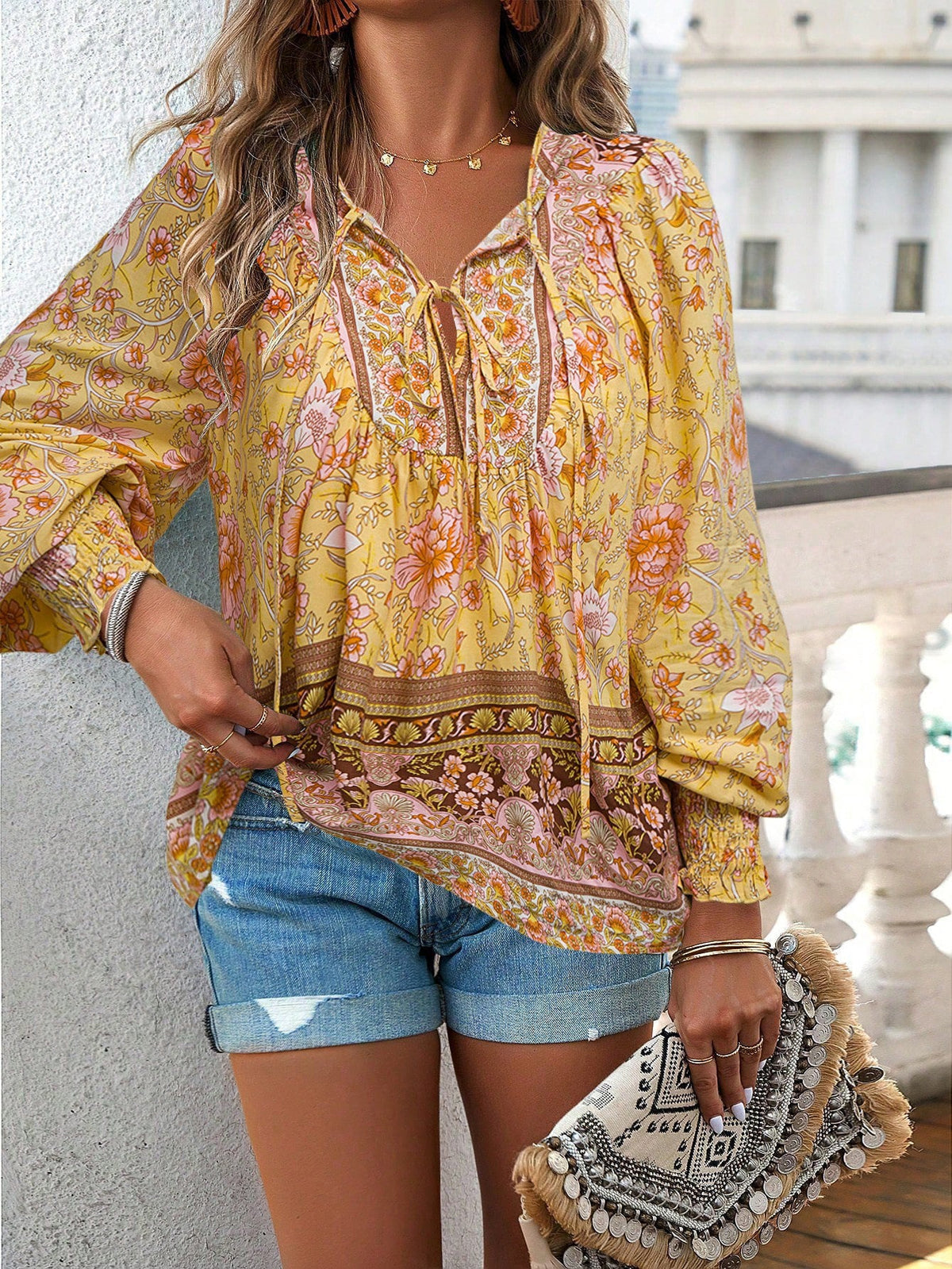Women's Blouse with Floral Patterns and Tie Neckline