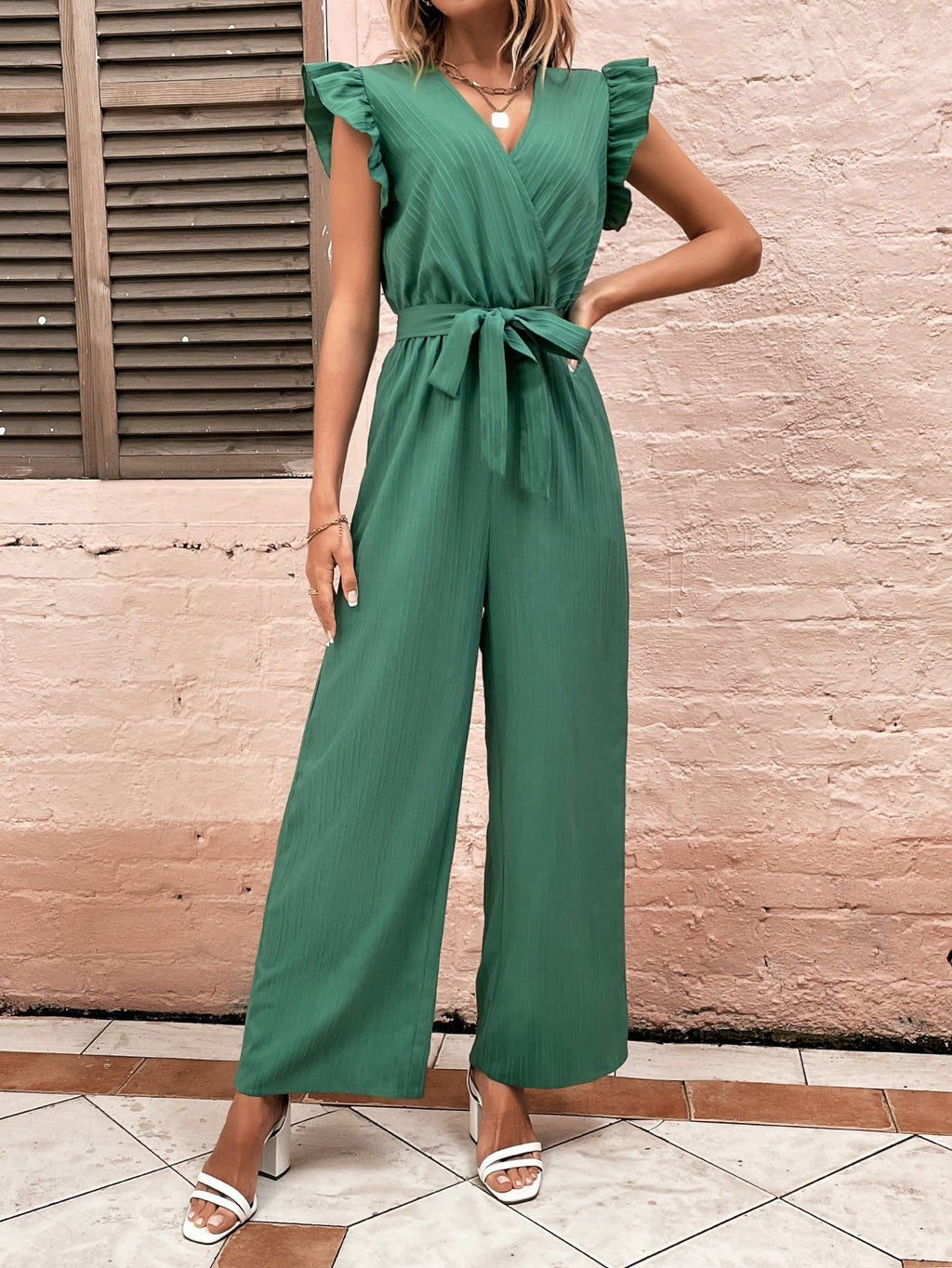 Elegant Jumpsuit with Waist Belt and Ruffle Details