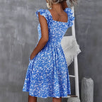 Women's Floral Dress with Flowing Skirt and Ruffle Details