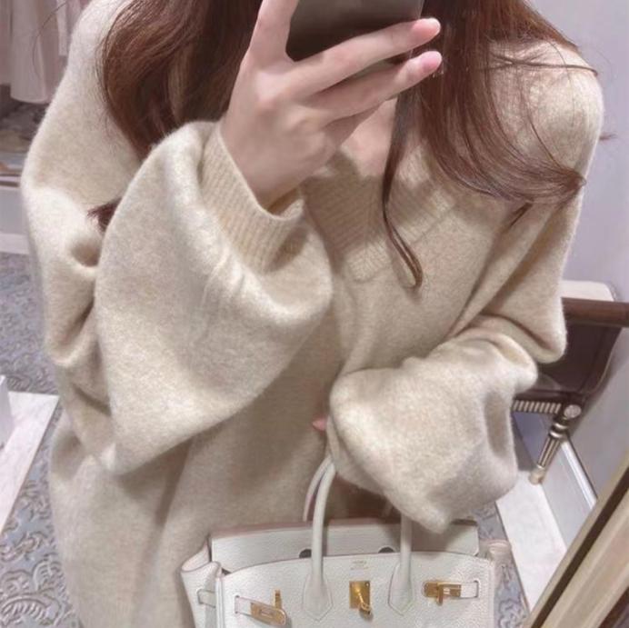 Women's Chunky Knit Sweater with Deep V-Neck and Voluminous Sleeves