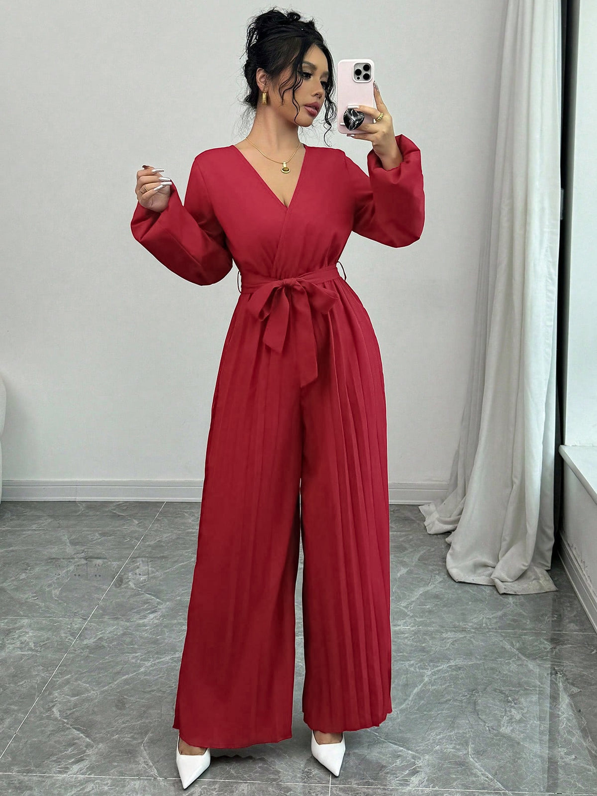 Elegant Jumpsuit with Adjustable Belt and Pleated Cut