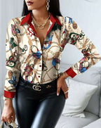 Elegant Blouse with Artistic Print and Decorative Accents