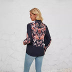 Women's Blouse with Floral Accents and Elegant Button Placket