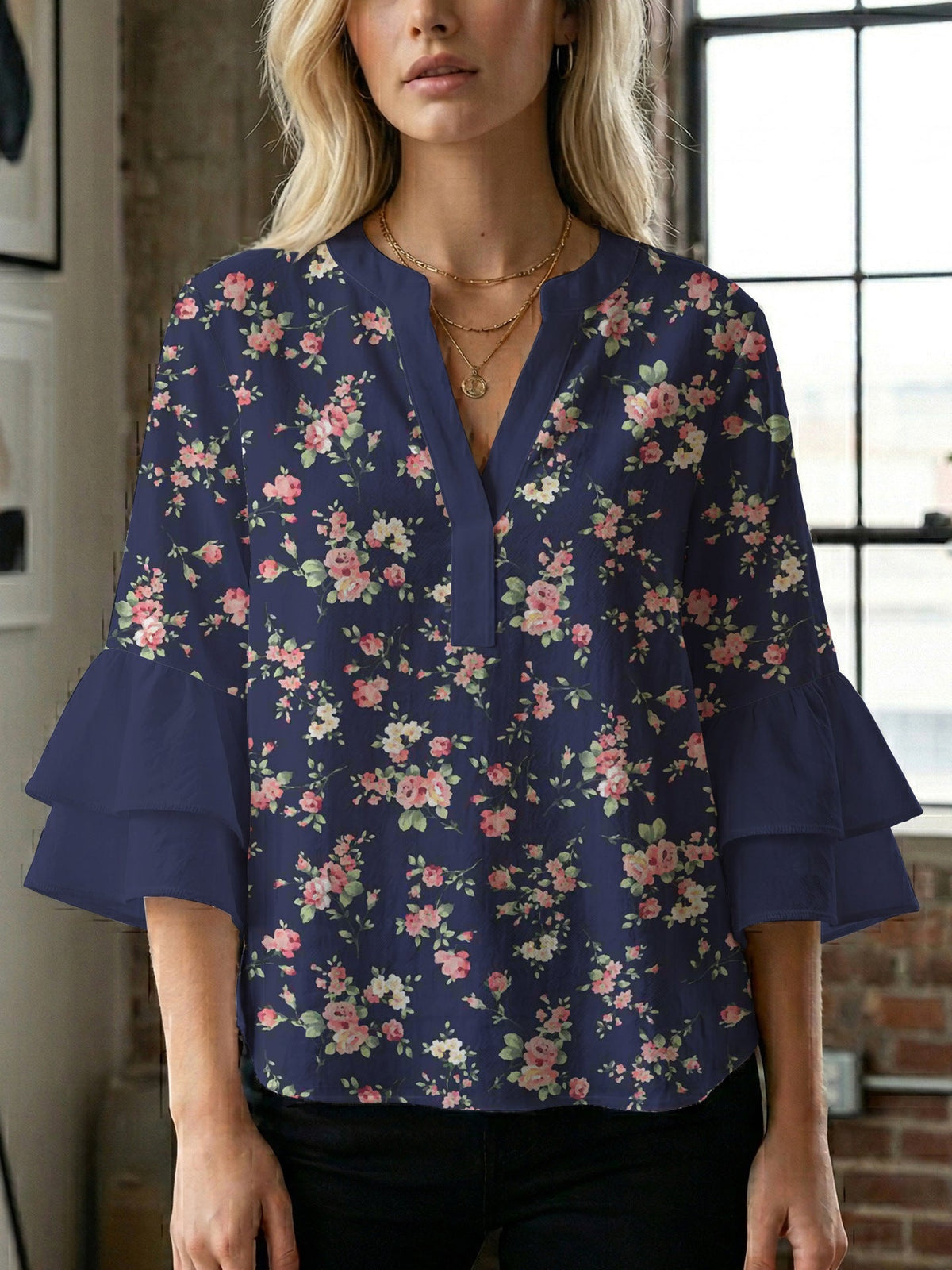 Women's Blouse with Voluminous Sleeves and Floral Design