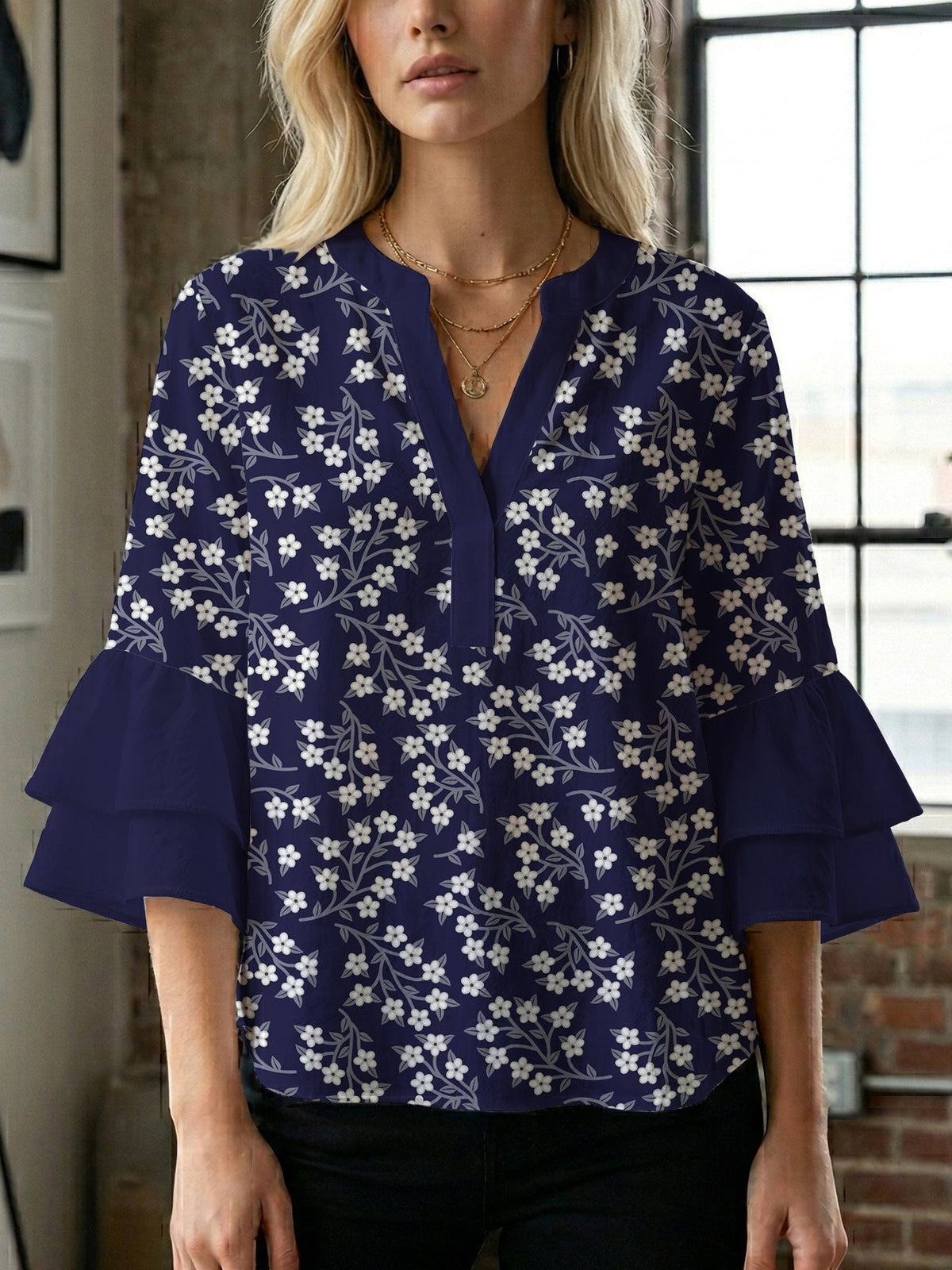 Women's Blouse with Voluminous Sleeves and Floral Design