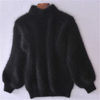 Women's fluffy turtleneck pullover with puff sleeves and textured design