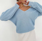 Elegant V-Neck Sweater with Fine Ribbed Texture and Drop Shoulders