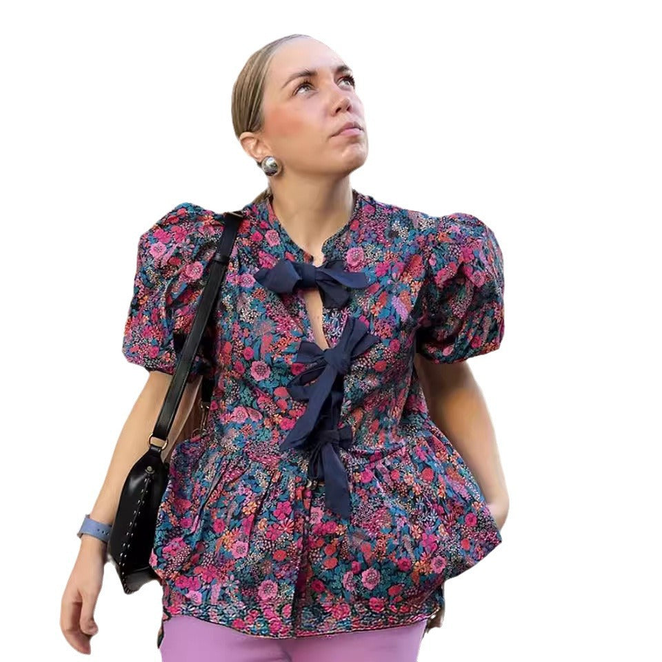 Blouse with Voluminous Sleeves and Floral Patterns