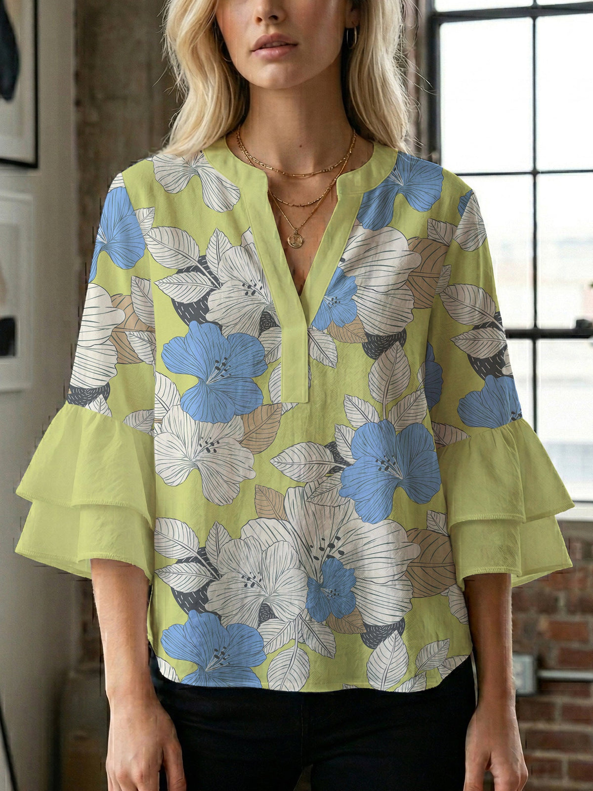 Women's Blouse with Voluminous Sleeves and Floral Design