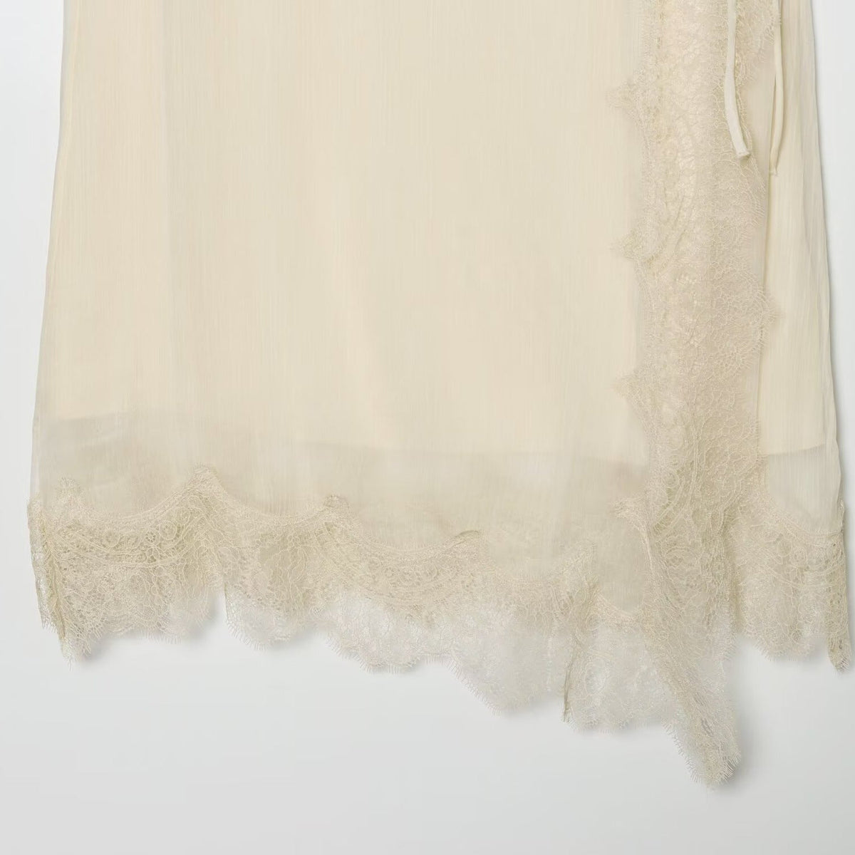 Women's Midi Skirt with Delicate Lace and Asymmetrical Hem