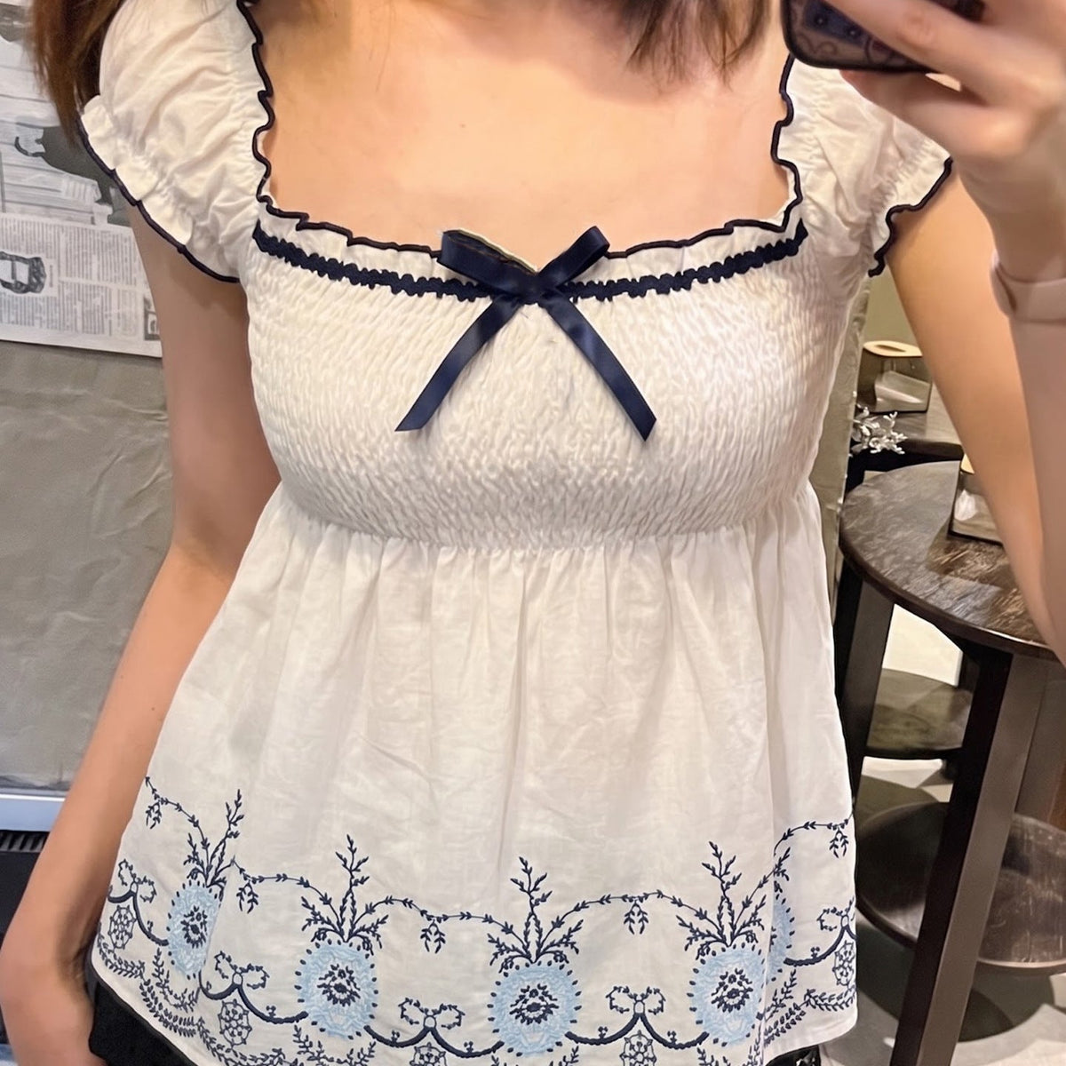Women's Cotton Blouse with Floral Embroidery and Ruffled Hem