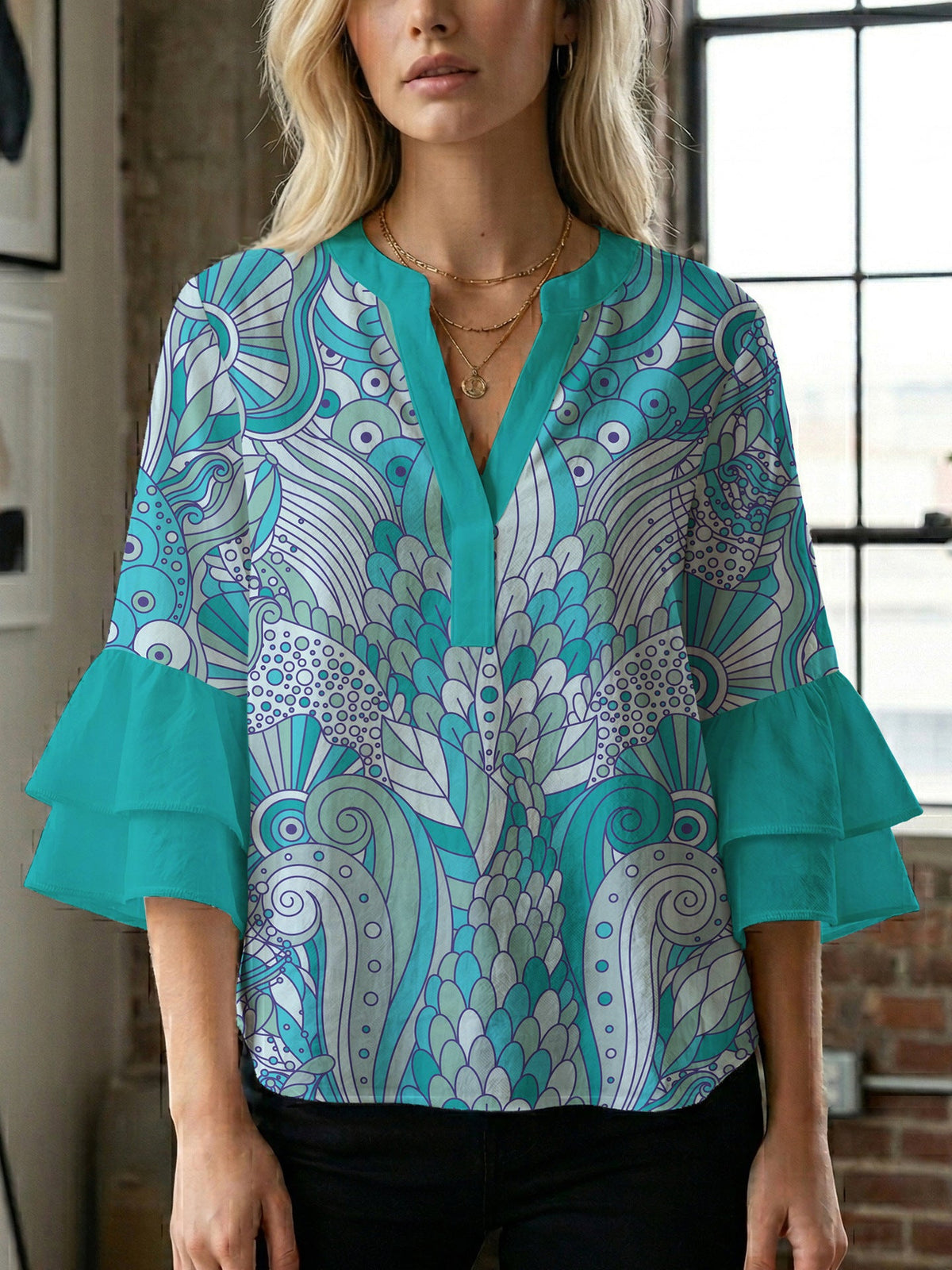 Women's Blouse with Voluminous Ruffle Sleeves and Floral Design