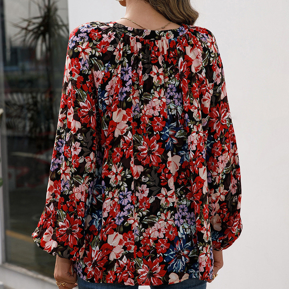 Women's Blouse with Floral Patterns and Airy Sleeves