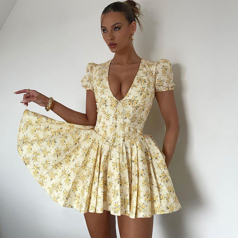 Women's Floral Mini Dress with Deep V-Neck and Playful Cut