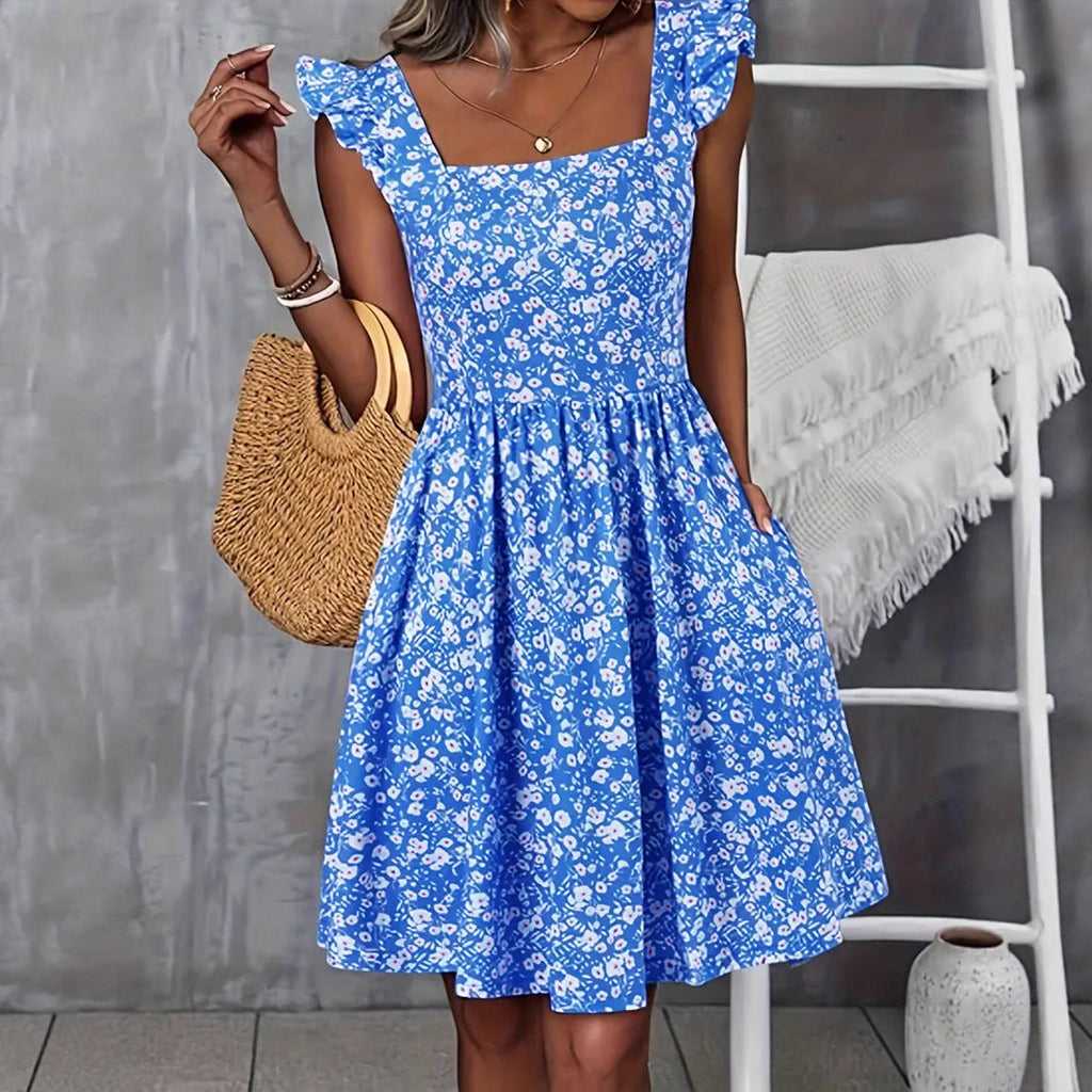 Women's Floral Dress with Flowing Skirt and Ruffle Details