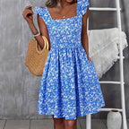 Women's Floral Dress with Flowing Skirt and Ruffle Details