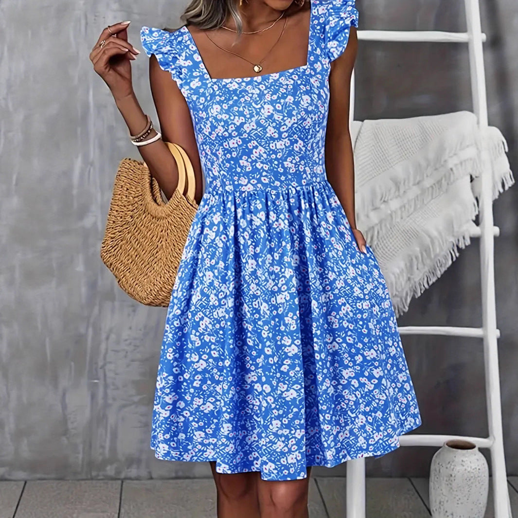 Women's Floral Dress with Flowing Skirt and Ruffle Details