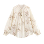 Women's Blouse with Floral Embroidery and Elegant Tassels