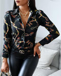 Elegant Blouse with Artistic Print and Decorative Accents