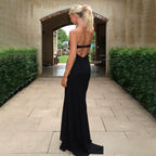 Elegant Evening Dress with Sophisticated Cut-Out and Flowing Hem