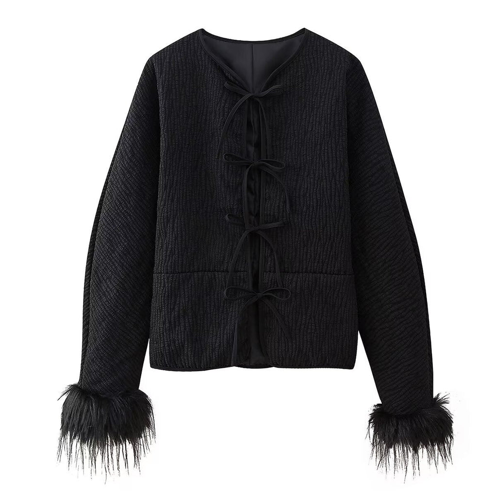 Elegant Quilted Jacket with Ruffle Details and High Collar