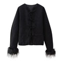 Elegant Quilted Jacket with Ruffle Details and High Collar