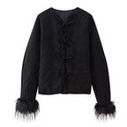 Elegant Quilted Jacket with Ruffle Details and High Collar
