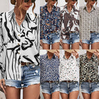 Elegant Women's Blouse with Modern Graphic Pattern and Deep Round Neckline