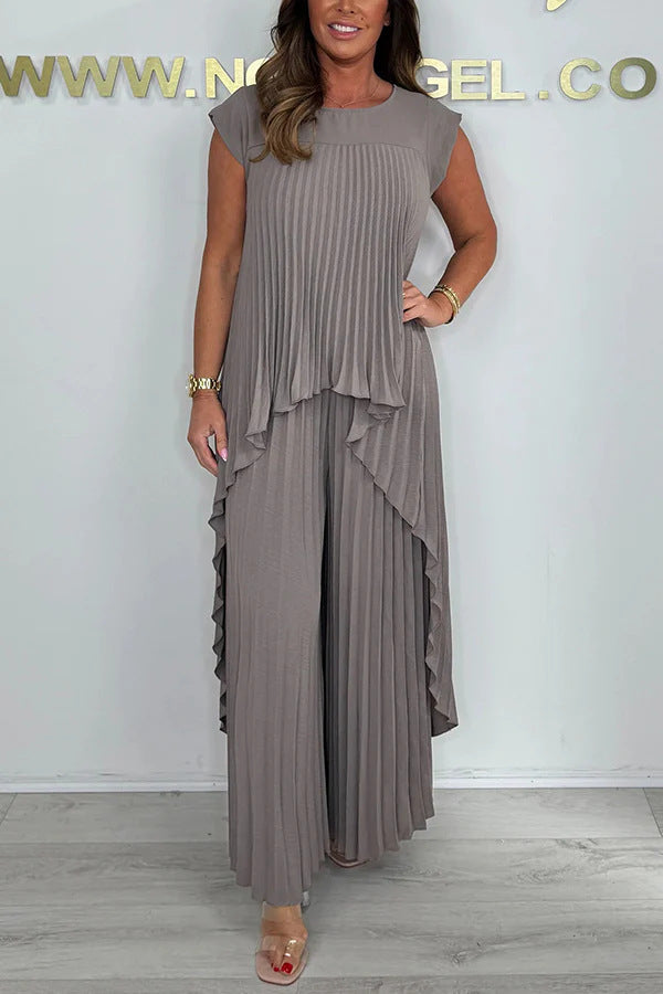 Elegant Pleated Jumpsuit with Asymmetric Hem