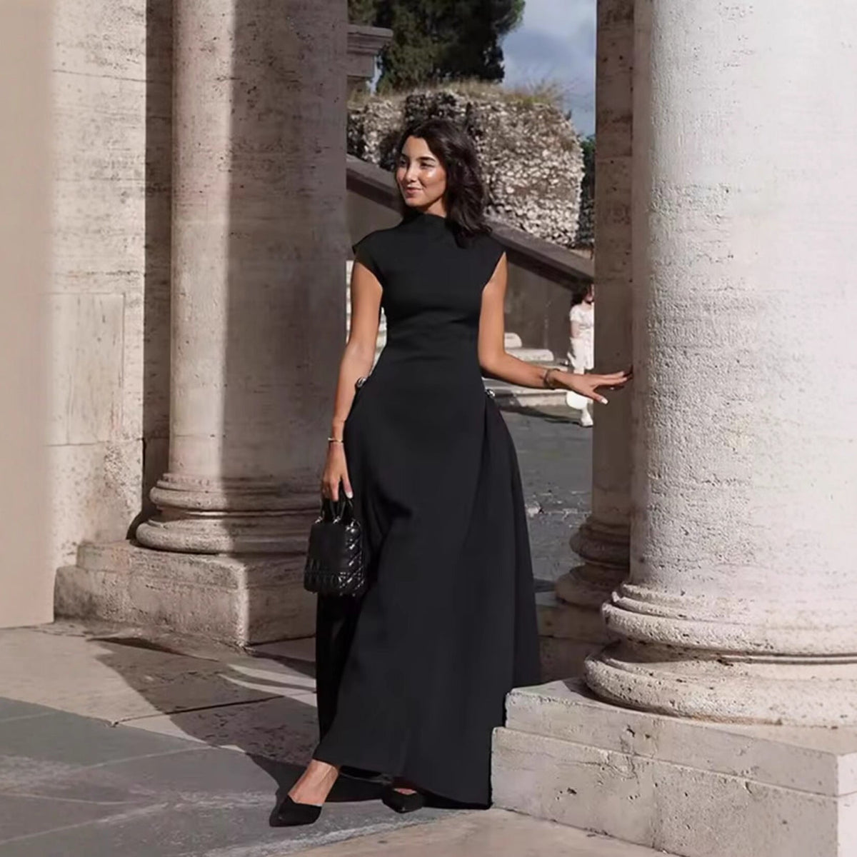 Women's Sleeveless Evening Dress with Asymmetrical Cut and Elegant Drape