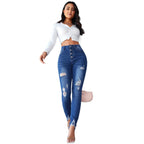 High-Waist Skinny Jeans with Distressed Details and Buttons