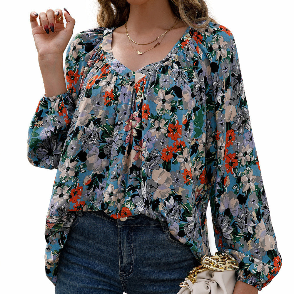 Women's Blouse with Floral Patterns and Airy Sleeves