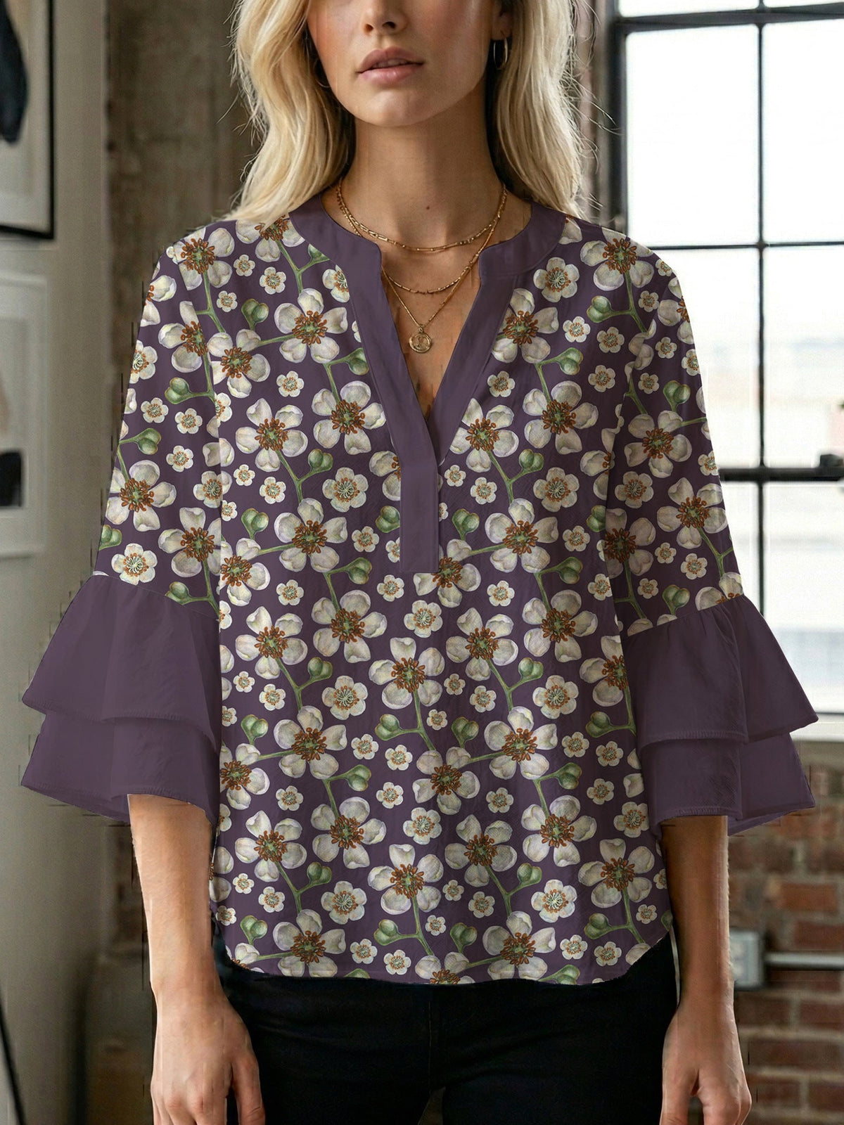Women's Blouse with Voluminous Sleeves and Floral Design