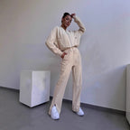 Women’s loungewear set with short zip jacket and high-waisted jogging pants with side split