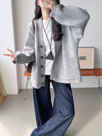 Women's Cozy Cardigan with Large Pockets and Button Detail