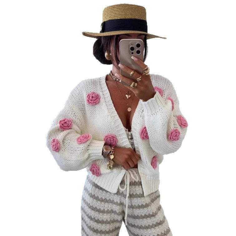Women's Cozy Knit Cardigan with Playful Floral Appliqués