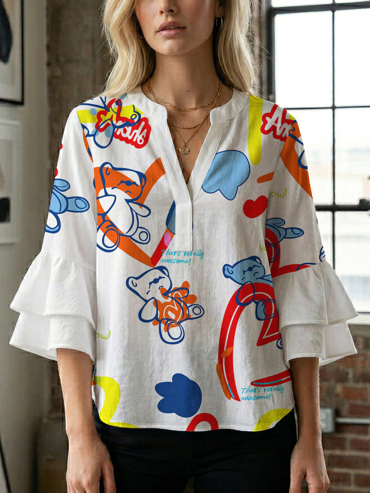 Women's Blouse with Voluminous Ruffle Sleeves and Modern Print