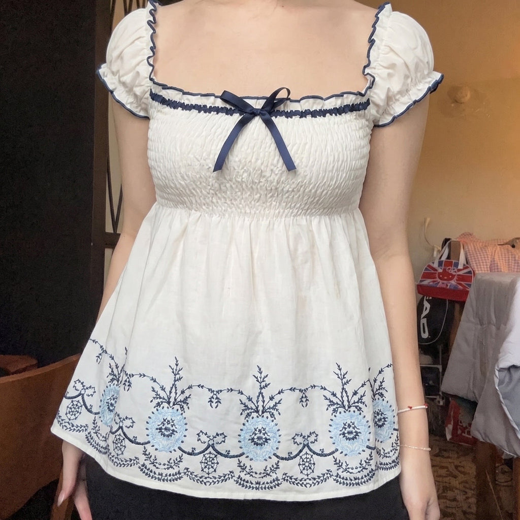 Women's Cotton Blouse with Floral Embroidery and Ruffled Hem