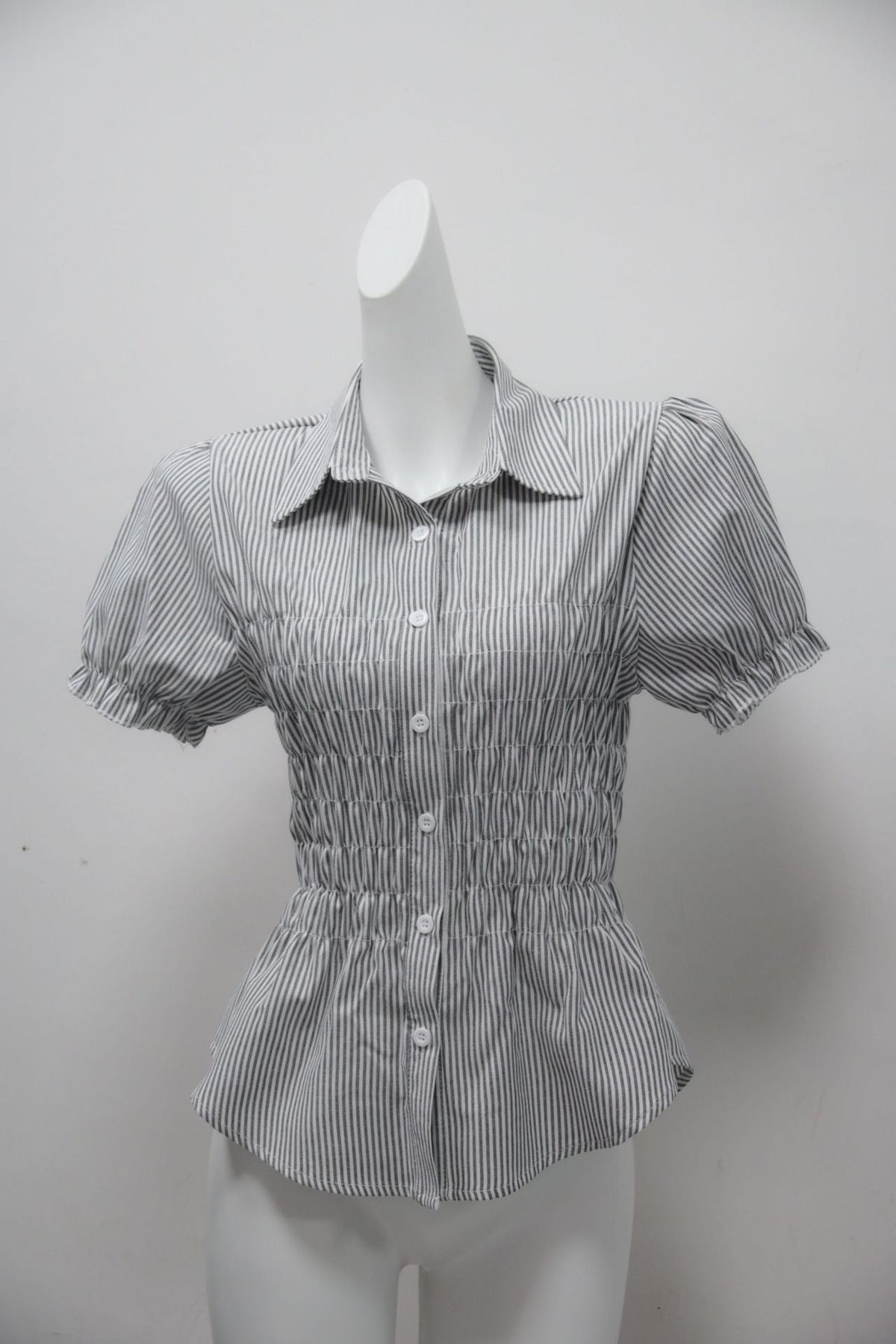 Women's Blouse with Tiered Ruffles and Fitted Cut