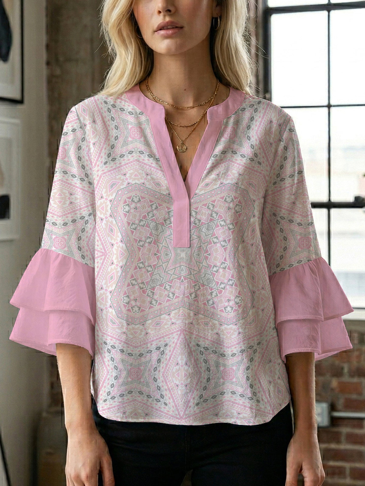 Women's Blouse with Voluminous Ruffle Sleeves and Floral Design