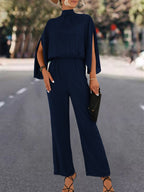 Elegant Women's Jumpsuit with Flowing Cape Design and High Neckline