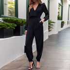 Elegant Jumpsuit with Sheer Sleeves and Deep V-Neck